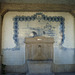 Fountain with tiles panel.