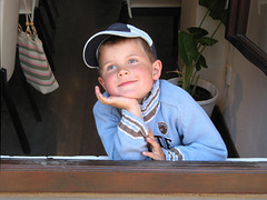 Smile from a boy in blue