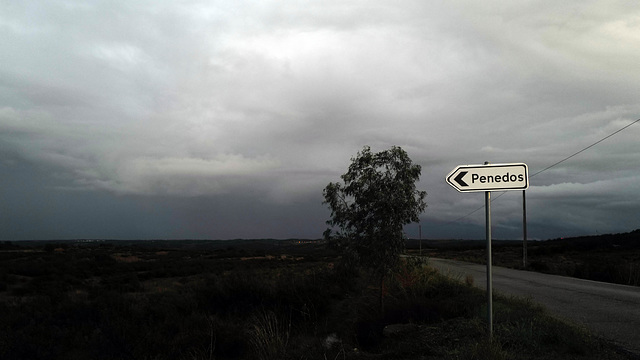 Penedos, nightfall in a rainy day