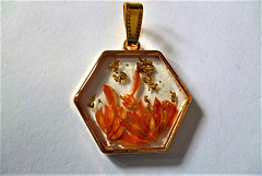 Another gold and orange pendant