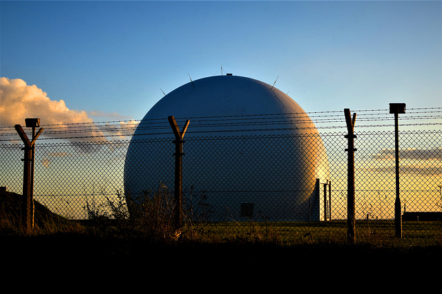 Top secret ball behind a fence.