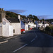 Lochinver main street.  Note: Achins Books sign