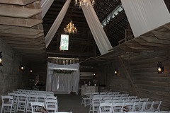 Photo # 2 ~~  Area of the large room where the vows are exchanged ~~(where I am here and behind me, are many more seats into a larger opening.)