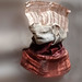 Sculpture by weaving different kinds of threads, among them, copper thread
