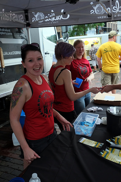 The local roller derby team volunteered to serve beer