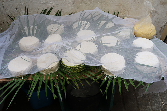 White cheese on palm leaves