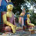 Kathmandu, Buddha Statues at the East Entrance to the Swayambhunath