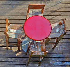 Quartet with red table