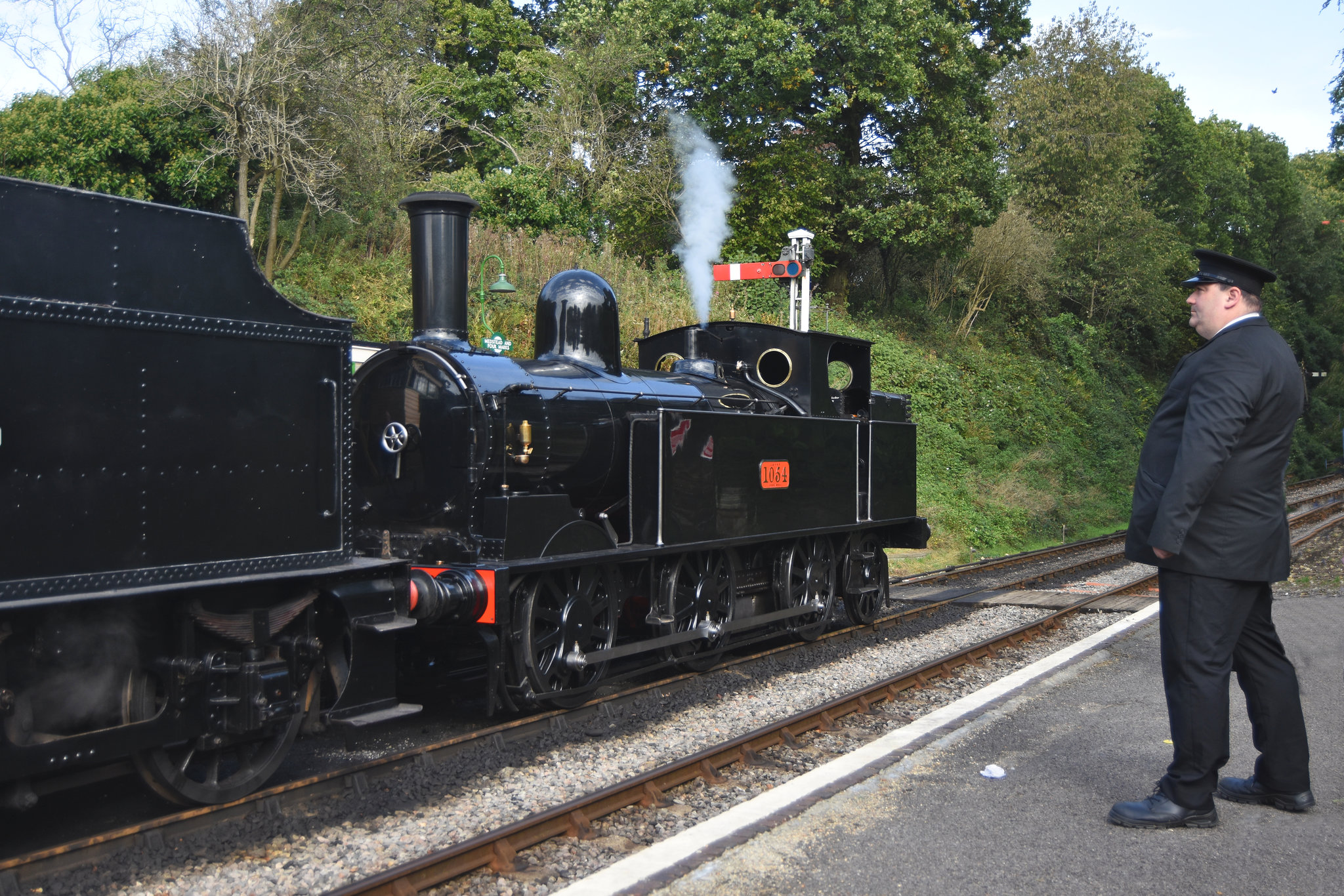 The controller admiring 'Coal Tank' locomotive # 1054