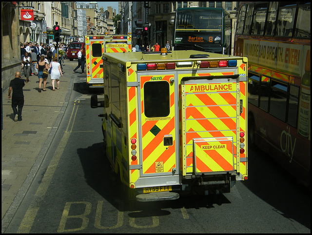 orange-striped ambulances