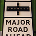 slow - major road ahead sign