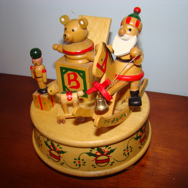 Animated wooden Christmas music box