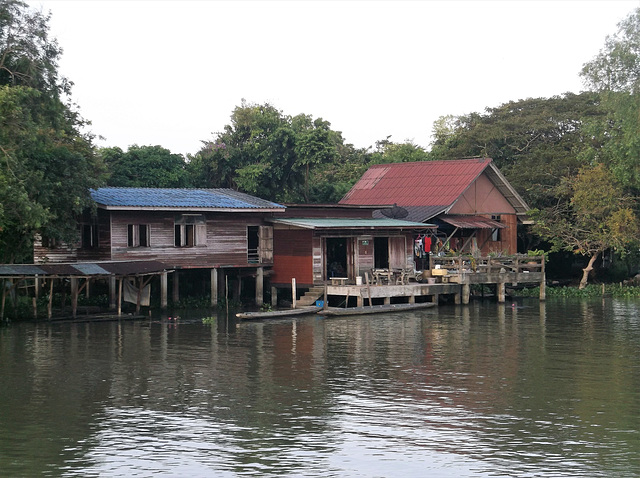 Wooden house trio by the river (1)