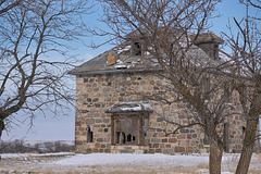 stone house and trees