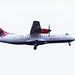 Loganair Plane Flying over the River Clyde to Land at Glasgow Airport