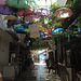 A gorgeous little street with hundreds of umbrellas