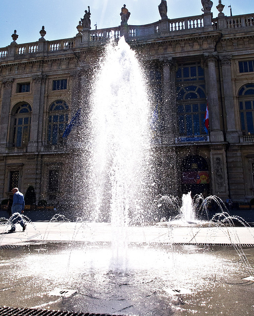 Turin, water games and light in front to Madama Palace