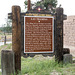 A sign showing the origins of this settlement