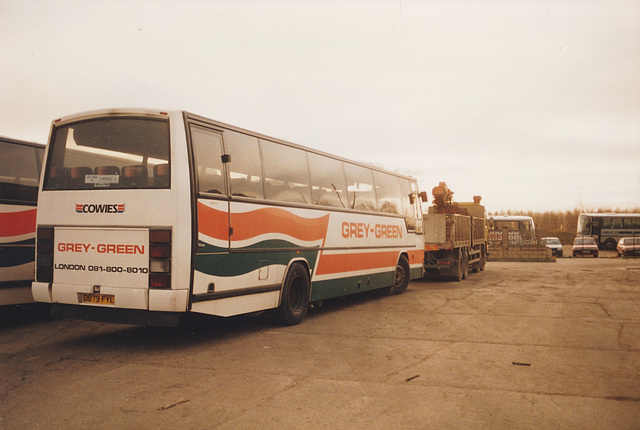 Grey Green vehicles parked near Cambridge Coach Services yard in Waterbeach – 6 Jan 1991 (135-23)