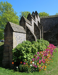 Stepped and buttressed wall