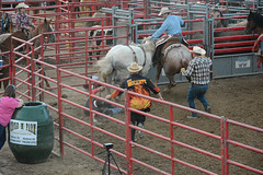 He's dragged by the rope around his midsection