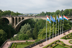 Flags Flying In Front Of Pont Adolphe