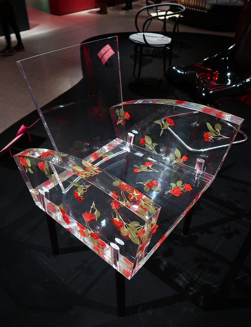 Perspex chair with roses.