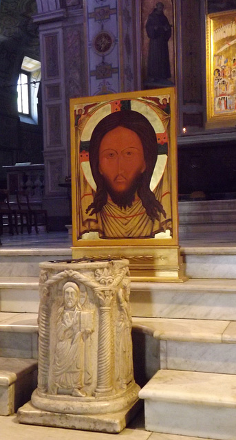 Wellhead and Icon inside the Church of San Bartolomeo on Tiber Island in Rome, June 2012