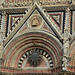 Italy, Details of the Duomo di Siena Facade above Main Gate