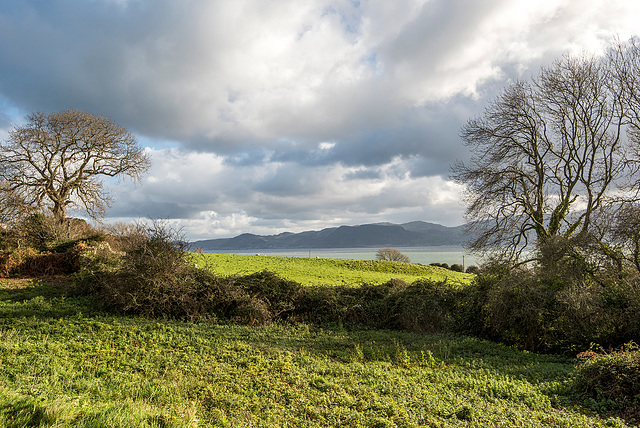 The Menai strait with the hills of Wales in the background