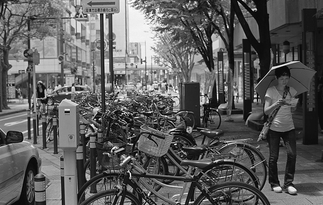 Bicycles parked on the sidewalk