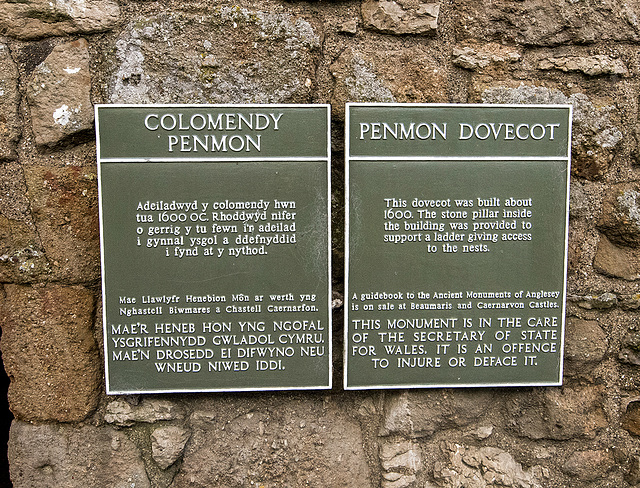 A sign on Penmon dovecot which was part of the Penmon priory