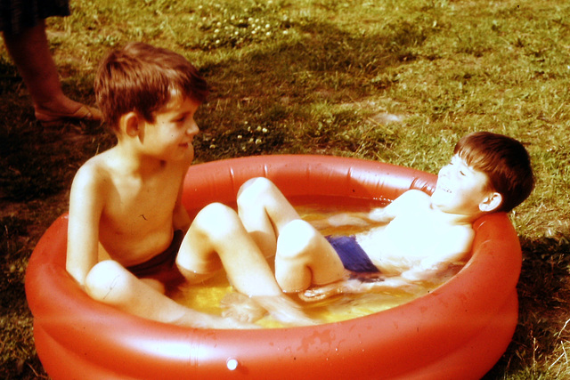 Steve and me in a tiny paddling pool, Hatfield, about 1962