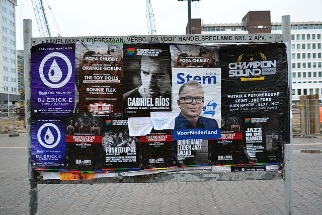 Political party poster amongst musicians