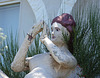 Detail of the Sculpture of a Female Nude on a Pedestal at Casa Basso, July 2011