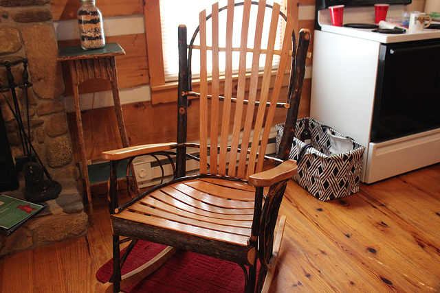 A rustic chair inside the cabin built by the owner of these cabins....next one over as well...!!  HE himself, built ALL his cabins that he rents .!!