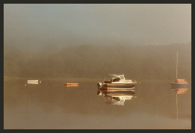 boats in the morning mist