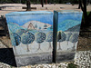 Street art on electricity boxes.