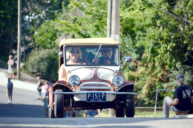 A happy couple climbs the hill