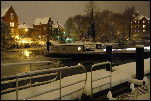 turning the boat on the icy river