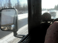 Slow snow plow in front, 50 cars behind