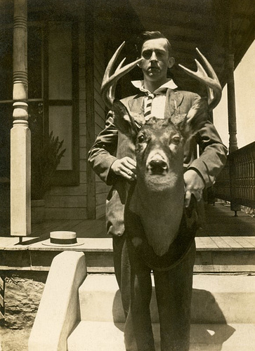 A Man and His Deer Head