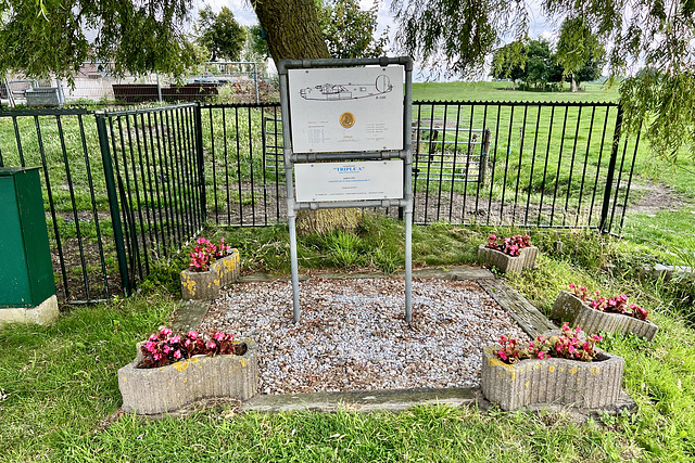 Memorial sign for the crashed B-24 bomber “Jolly Duck” from the Second World War