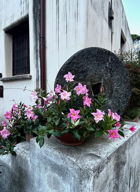 A decorative millstone.