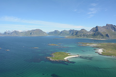 Norway, Lofoten Islands, Islets of Ytresand Bay and Mountains of the Island of Flakstadøya