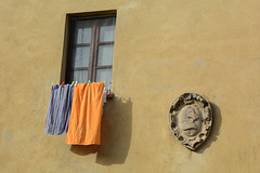 Italy, Pienza, Window, Drying Towels and Someone's Coat of Arms