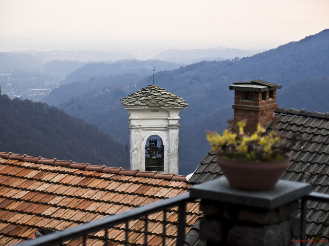 From above the roofs of the village, the top of the bell tower you can look down on the valley and the plains