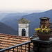 From above the roofs of the village, the top of the bell tower you can look down on the valley and the plains