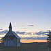 a crescent moon and country church