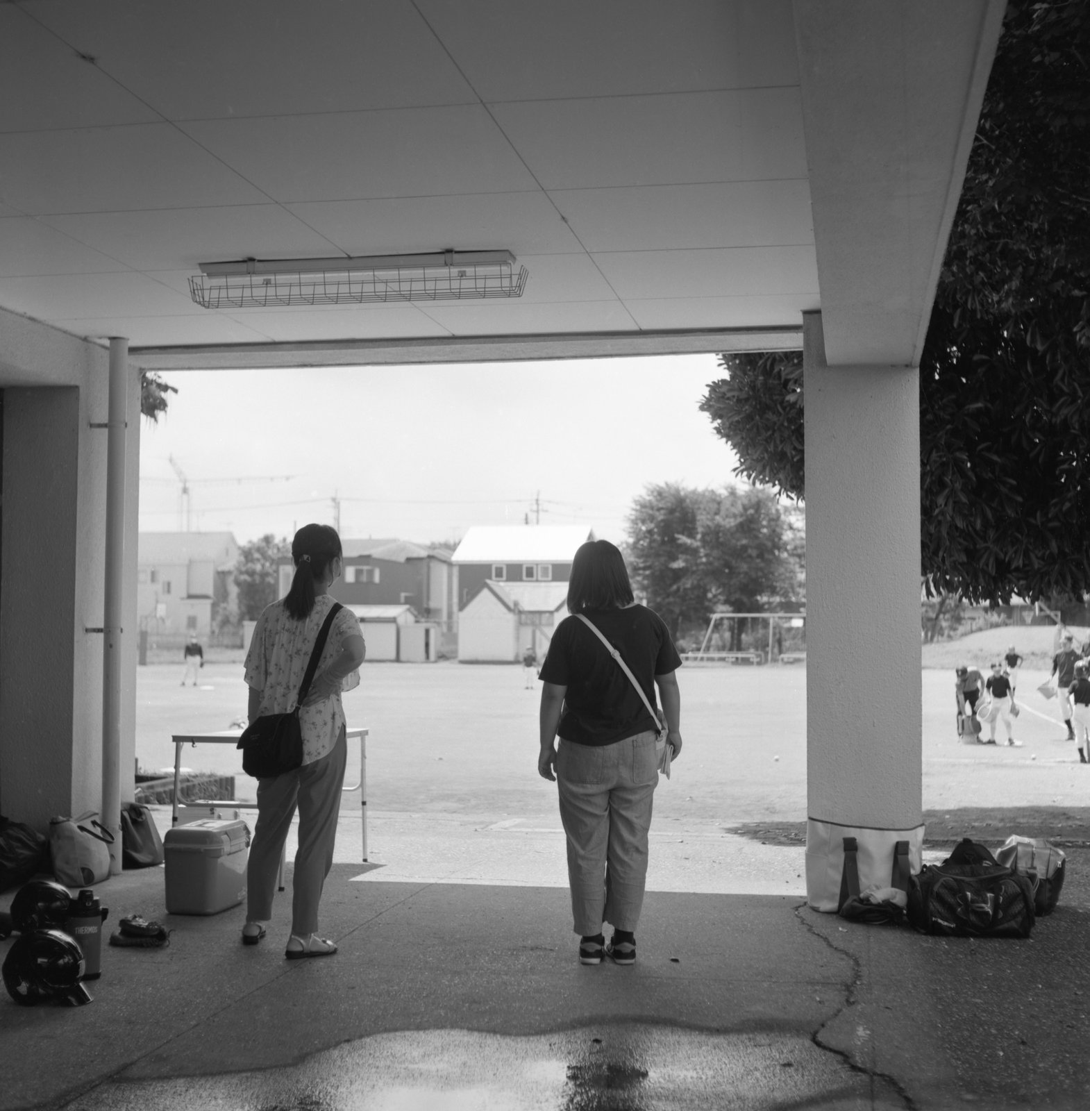 Parents in the cool shade